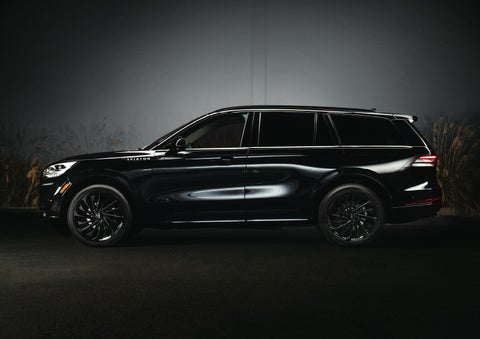 A 2024 Lincoln Aviator® SUV is shown in the Infinite Black exterior color | Lincoln Demo 1 in Wooster OH