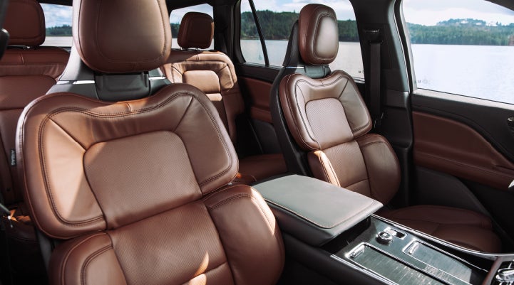 The front row's Perfect Position Seats in a 2024 Lincoln Aviator® Reserve model with Ebony Roast interior | Lincoln Demo 1 in Wooster OH
