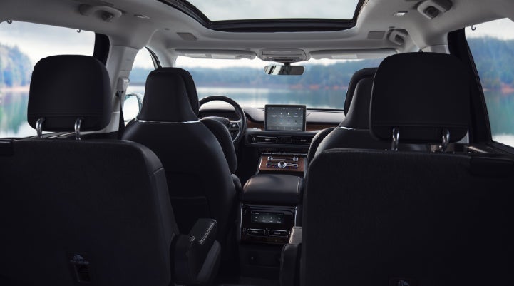 The interior of a 2024 Lincoln Aviator® SUV from behind the second row | Lincoln Demo 1 in Wooster OH