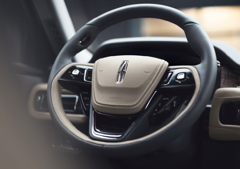 The intuitively placed controls of the steering wheel on a 2024 Lincoln Aviator® SUV | Lincoln Demo 1 in Wooster OH