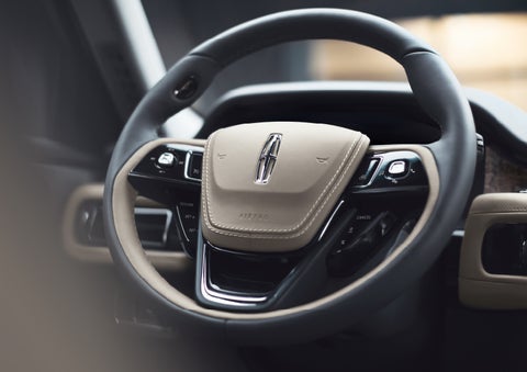 The intuitively placed controls of the steering wheel on a 2024 Lincoln Aviator® SUV | Lincoln Demo 1 in Wooster OH