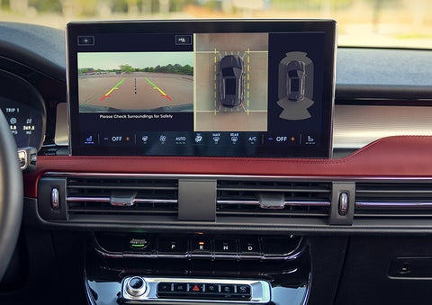 The driver of a 2024 Lincoln Corsair® SUV is shown selecting the drive mode. | Lincoln Demo 1 in Wooster OH