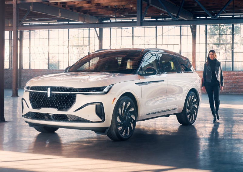 A person approaches a 2024 Lincoln Nautilus® SUV. | Lincoln Demo 1 in Wooster OH