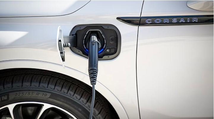 An electric charger is shown plugged into the charging port of a Lincoln Corsair® Grand Touring
model. | Lincoln Demo 1 in Wooster OH